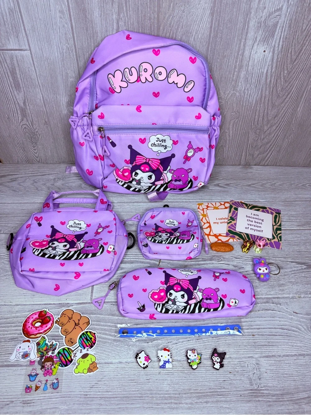 Kuromi backpack bundle , croc charms , keychain , stickers , pen , dragons bags